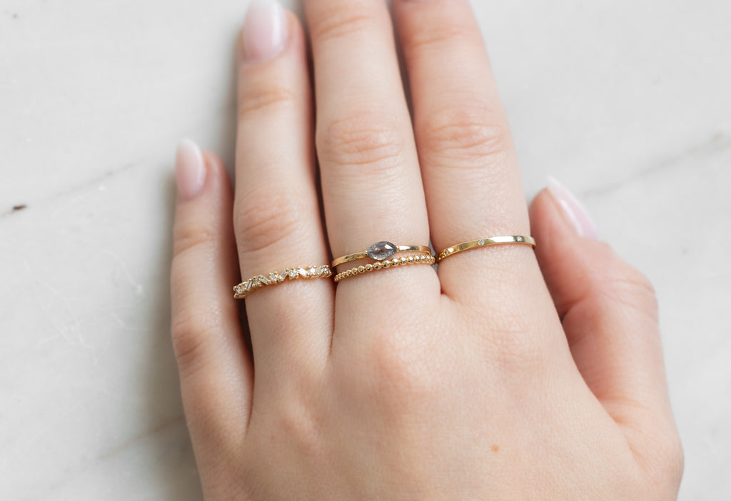 Baguette Confetti Stacking Band on Model as a Right Hand Ring