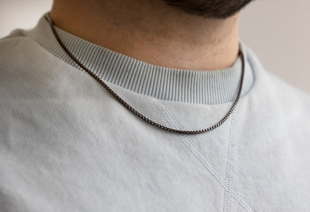 Men's Box Chain Necklace on Model wearing sky blue crew neck