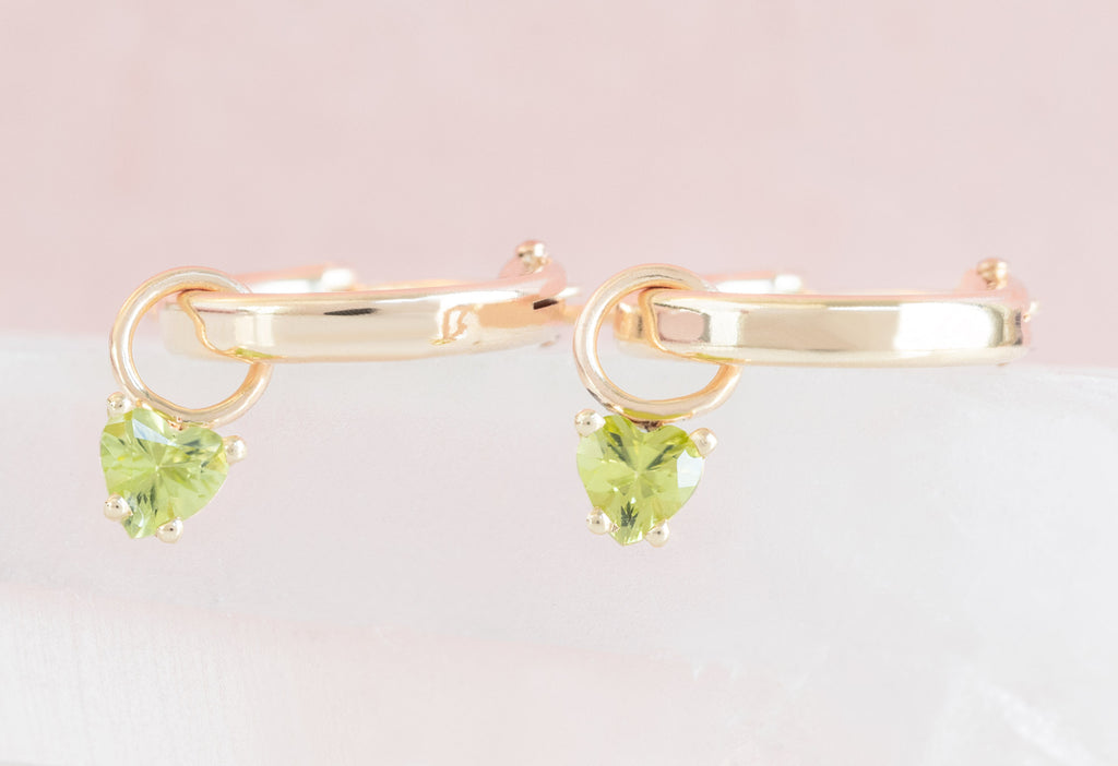 Side View of Yellow Gold Peridot Heart Hoops