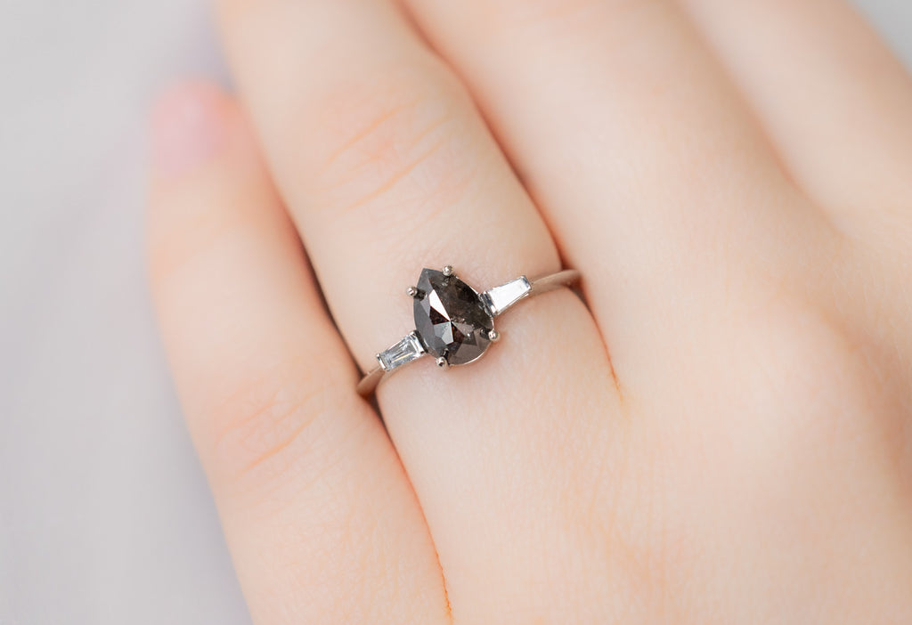 The Ash Ring with a Rose-Cut Black Diamond on Model
