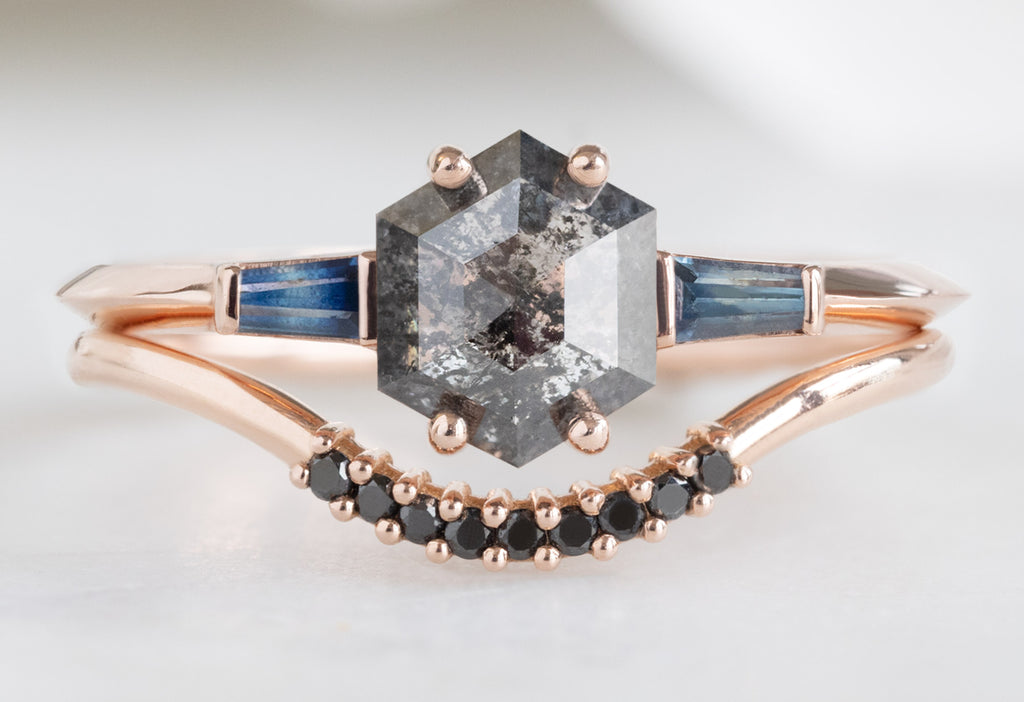 The Ash Ring with a Salt and Pepper Hexagon Diamond with Black Pavé Arc Stacking Band