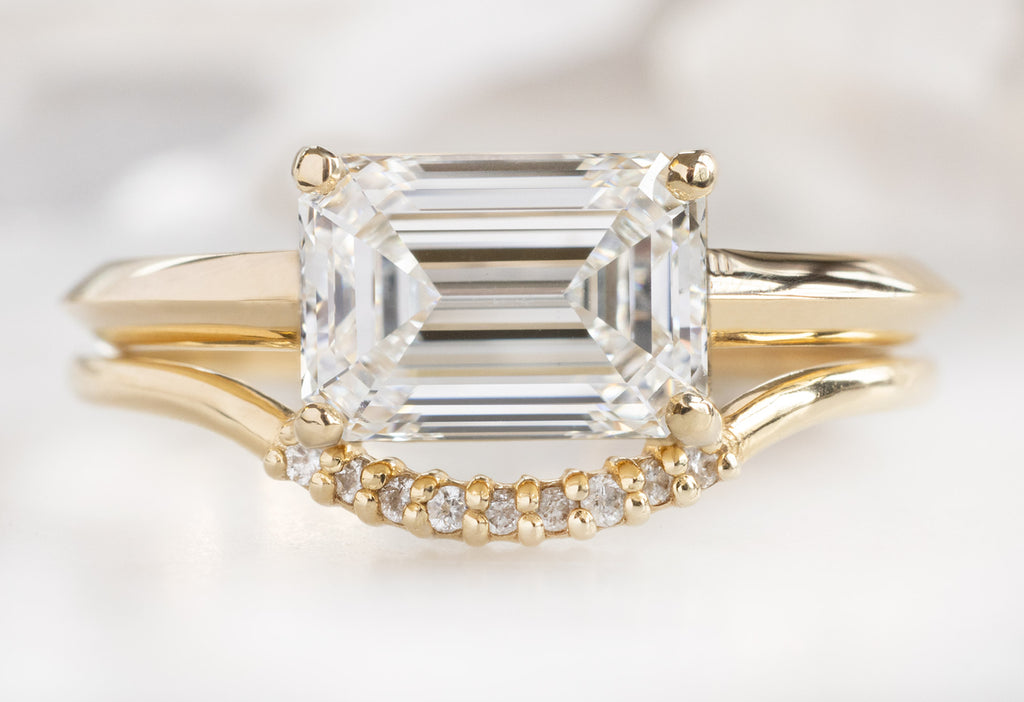 The Bryn Ring with an Emerald-Cut Lab Grown Diamond with Pavé Arc Stacking Band
