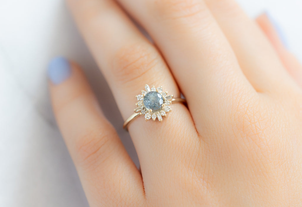 The Compass Ring with a Round-Cut Montana Sapphire on Model