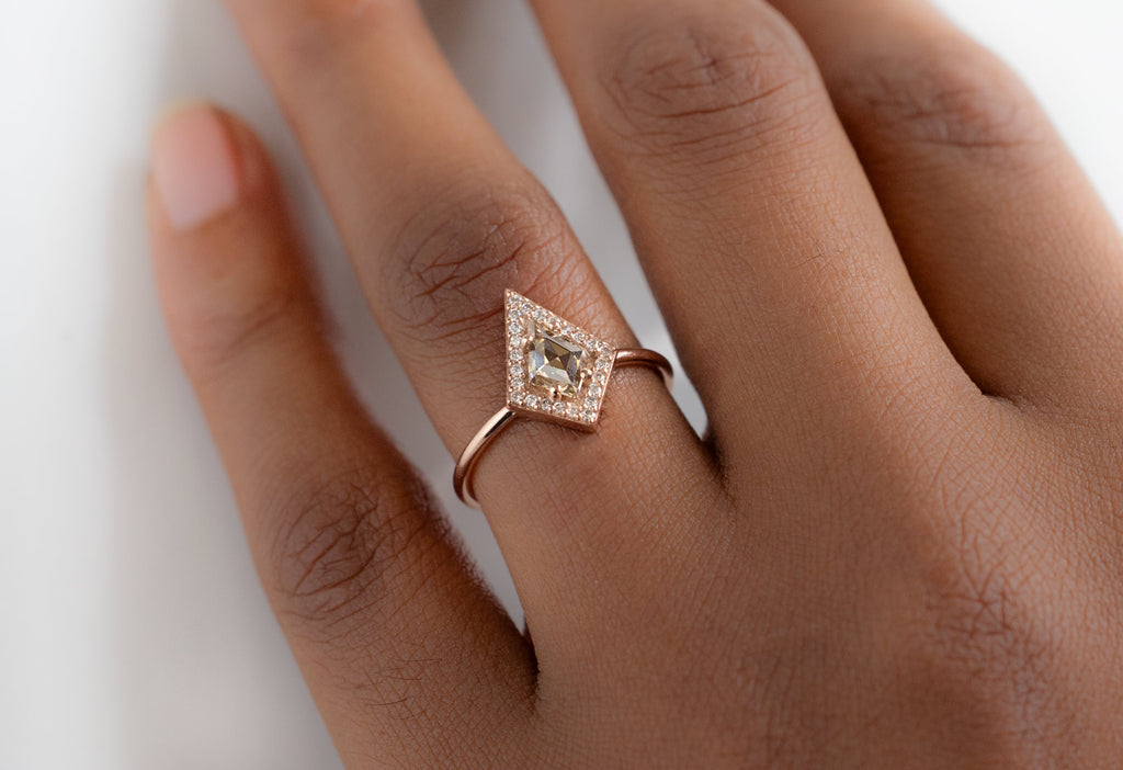 The Dahlia Ring with a Kite-Shaped Champagne Diamond on Model
