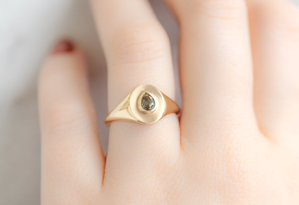 The Pear-Cut Montana Sapphire Signet Ring on Model