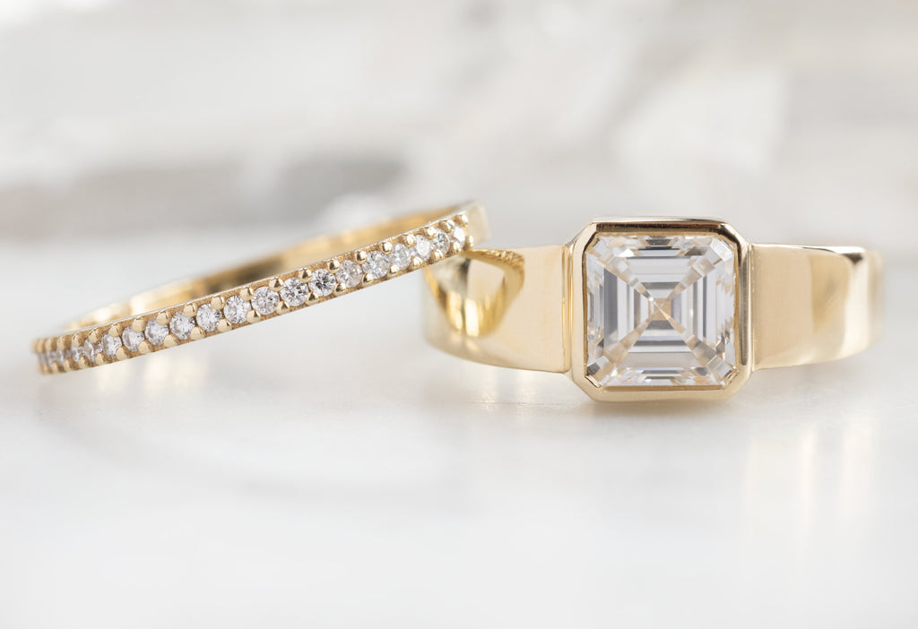 The Signet Ring with an Asscher-Cut Lab Grown Diamond with Pavé Diamond Stacking Band