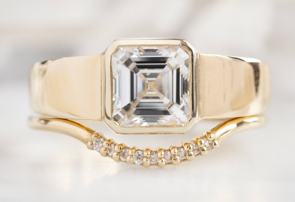 The Signet Ring with an Asscher-Cut Lab Grown Diamond with the Pavé Arc Stacking Band